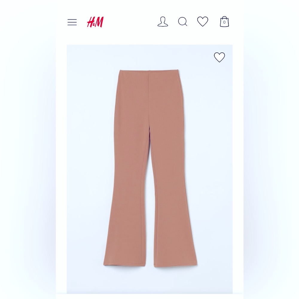 Cream/Tan colored pants. Size medium.